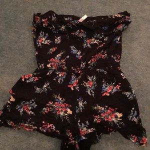 Floral romper with ruffled neckline
